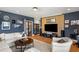 Modern living room featuring a stylish accent wall, with comfortable seating at 1354 Fernwood Ne Cir, Brookhaven, GA 30319