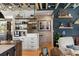 Bright living room with an open kitchen, featuring modern appliances and stylish decor at 1354 Fernwood Ne Cir, Brookhaven, GA 30319