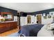 A beautifully decorated main bedroom boasts hardwood floors, custom closet and attached ensuite bathroom at 1354 Fernwood Ne Cir, Brookhaven, GA 30319