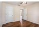 Bedroom showing closet doors and updated flooring at 257 Se Ashland Park Se Ct, Lawrenceville, GA 30045