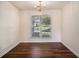 Cozy dining room featuring wood floors, neutral walls, and a chandelier at 257 Se Ashland Park Se Ct, Lawrenceville, GA 30045