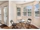 Bright breakfast nook with backyard view; perfect for morning coffee at 257 Se Ashland Park Se Ct, Lawrenceville, GA 30045