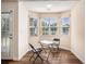 Cozy dining area bathed in natural light from backyard view at 257 Se Ashland Park Se Ct, Lawrenceville, GA 30045