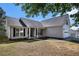 Charming one-story home with neutral siding, inviting front porch, and well-maintained lawn at 257 Se Ashland Park Se Ct, Lawrenceville, GA 30045