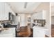 Efficient kitchen with white cabinets, stainless steel appliances, and modern backsplash at 257 Se Ashland Park Se Ct, Lawrenceville, GA 30045