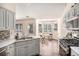 Open eat-in kitchen space with a large bay window overlooking backyard at 257 Se Ashland Park Se Ct, Lawrenceville, GA 30045