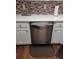 Updated kitchen featuring stainless steel dishwasher and white cabinets for a clean, modern look at 257 Se Ashland Park Se Ct, Lawrenceville, GA 30045