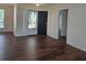 Inviting living room with hardwood floors and a bright entry door providing ample natural light at 257 Se Ashland Park Se Ct, Lawrenceville, GA 30045