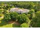 Stately white building featuring a central porch flanked by trees, situated in a leafy and picturesque neighborhood at 3227 Collier Gate Se Ct, Smyrna, GA 30080