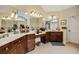 Bathroom featuring lots of counter space, double sinks, and cabinetry at 3227 Collier Gate Se Ct, Smyrna, GA 30080