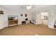 Spacious carpeted bedroom with a ceiling fan and plenty of natural light at 3227 Collier Gate Se Ct, Smyrna, GA 30080