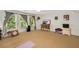 Large bonus room featuring neutral walls, carpet, and natural light from the windows at 3227 Collier Gate Se Ct, Smyrna, GA 30080