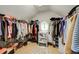 Walk-in closet with lots of storage featuring custom shelving and racks at 3227 Collier Gate Se Ct, Smyrna, GA 30080