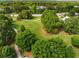 Scenic aerial view of green park area with winding walking paths surrounded by mature trees and landscaping at 3227 Collier Gate Se Ct, Smyrna, GA 30080