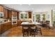 Spacious kitchen with wood cabinets, stainless steel appliances, and a breakfast bar at 3227 Collier Gate Se Ct, Smyrna, GA 30080