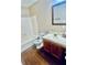 Bathroom features wood-look floor and vanity at 401 Autumn Leaf Way, Norcross, GA 30093