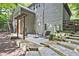 Backyard patio with stone accents, creating an outdoor living space at 4246 Loch Highland Ne Pkwy, Roswell, GA 30075