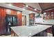 Modern kitchen features an oversized island, stainless appliances, and plenty of cabinet space at 4246 Loch Highland Ne Pkwy, Roswell, GA 30075