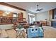 Cozy living room with a fireplace, comfortable seating, and natural light creates an inviting space at 4246 Loch Highland Ne Pkwy, Roswell, GA 30075