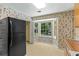 Cozy kitchen featuring a bay window offering views of the backyard at 5340 Young Deer Dr, Cumming, GA 30041