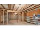 Unfinished basement space offers plenty of storage space and the opportunity to be finished to your liking at 5655 Stevehaven Ln, Cumming, GA 30028
