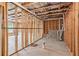 Unfinished basement space has roughed in plumbing, a window for natural light and is ready to be finished to your liking at 5655 Stevehaven Ln, Cumming, GA 30028