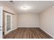 Bonus room with fresh paint, sliding glass door, and hardwood floors at 225 Fireside Way, Fairburn, GA 30213