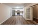 Eat-in kitchen featuring white cabinets, stainless steel appliances, and modern tile backsplash at 225 Fireside Way, Fairburn, GA 30213
