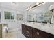 Bathroom with double vanity and large mirror at 255 Broken Lance Pl, Johns Creek, GA 30022