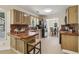 The updated kitchen is equipped with stainless steel appliances, wood countertop, tile backsplash at 255 Broken Lance Pl, Johns Creek, GA 30022