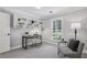 Bright home office with built-in shelves and natural light at 255 Broken Lance Pl, Johns Creek, GA 30022