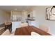Open-concept kitchen with granite countertops, stainless steel appliances, and a dining area at 55 Bandimere Pkwy, Dallas, GA 30157