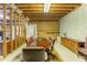 Basement featuring a large conference table with brown leather chairs at 8470 Lazy Oaks Ct, Atlanta, GA 30350