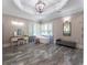 Modern bathroom featuring a freestanding tub, vanity, and luxurious marble floors at 8470 Lazy Oaks Ct, Atlanta, GA 30350