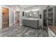 Spacious primary bath with double sink vanity, tile floors and storage at 8470 Lazy Oaks Ct, Atlanta, GA 30350