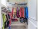 Walk-in closet with double shelves and rows of hanging clothes at 8470 Lazy Oaks Ct, Atlanta, GA 30350