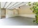 Spacious garage with epoxy floor, storage cabinets and natural light at 8470 Lazy Oaks Ct, Atlanta, GA 30350