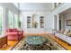 Elegant living room featuring a built-in bookcase at 8470 Lazy Oaks Ct, Atlanta, GA 30350