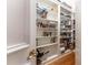 Walk-in pantry with well-organized shelving, providing ample storage space at 8470 Lazy Oaks Ct, Atlanta, GA 30350