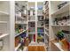 Walk-in pantry featuring generous shelving, perfect for organizing food items and kitchen essentials at 8470 Lazy Oaks Ct, Atlanta, GA 30350
