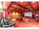 Spacious theater room with custom wood ceiling, screen, and comfortable seating at 8470 Lazy Oaks Ct, Atlanta, GA 30350