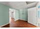 Wide open finished basement with hardwood floors and access to additional rooms at 1713 Dudley Dr, Woodstock, GA 30188
