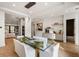 Bright dining room features a glass table, sleek lighting, and built-in buffet at 185 Pebble Trl, Alpharetta, GA 30009