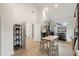 Spacious dressing room with display racks, table, and seating beneath vaulted ceilings at 185 Pebble Trl, Alpharetta, GA 30009