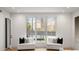 Sitting area off the main bedroom features a view of the backyard pool at 185 Pebble Trl, Alpharetta, GA 30009