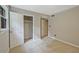 Bright bedroom featuring a closet, neutral walls, and views of the backyard at 3327 Spring Meadow Ct, Tucker, GA 30084