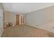 Spacious living room with neutral carpet and ample natural light at 3327 Spring Meadow Ct, Tucker, GA 30084