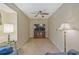 Comfortable living room with plush chairs, TV, and ceiling fan at 3327 Spring Meadow Ct, Tucker, GA 30084