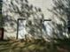 View of house exterior shows two white basement doors and siding at 384 Daniel Mill Xing, Villa Rica, GA 30180