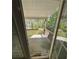 Outdoor wooden deck overlooks serene, wooded backyard, providing a private relaxation space at 384 Daniel Mill Xing, Villa Rica, GA 30180